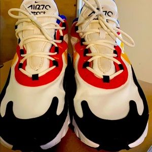 Size 9. Multi Colored Nike Reacts.